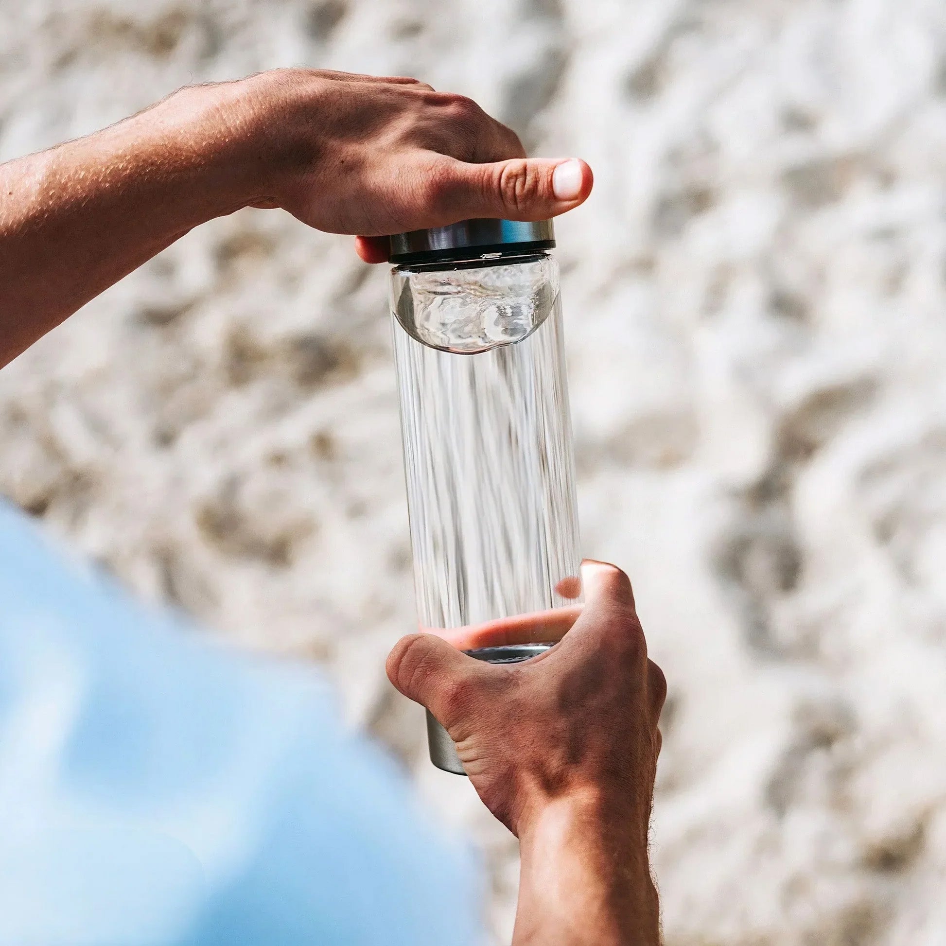 Athlete drinking HydroUp hydrogen water bottle for performance boost